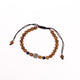 Brǎțarǎ ațǎ bile lemn si medalion NIKA metal.   D37-70