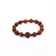 Brǎțarǎ elastic bile lemn si cruce lemn.  OT08-110
