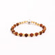 Brǎțarǎ elastic bila 'ochi de tigru' si cruce metal OT33-257