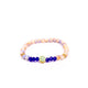Brǎțarǎ elastic bile marmorate+fațetate si cruce metal aurie.   AB200-33