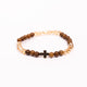 Brǎțarǎ elastic bile lemn/carbune cu cruce ştrasuri negre.  OT08-148
