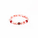 Brǎțarǎ elastic bile marmorate si cruce metal.  AB200-34