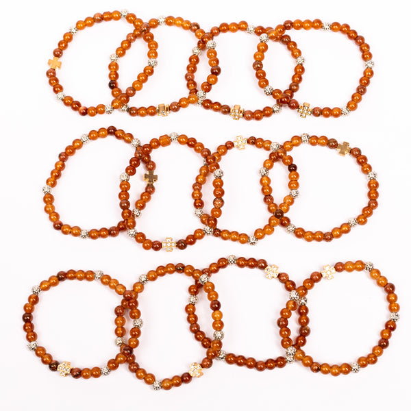 Brǎțarǎ elastic cu cruce metal aurie cu ştras. OT33-241