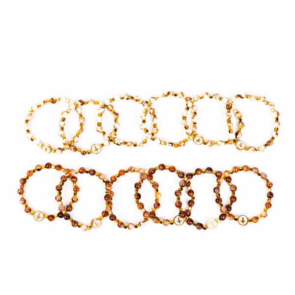 Brațarǎ bile plastic marmorate cu cruce rotundǎ sidef.  AC01-2