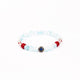 Brǎțarǎ elastic bile marmorate si cruce metal.  AB200-34
