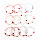 Brǎțarǎ elastic bile marmorate si cruce metal.  AB200-34