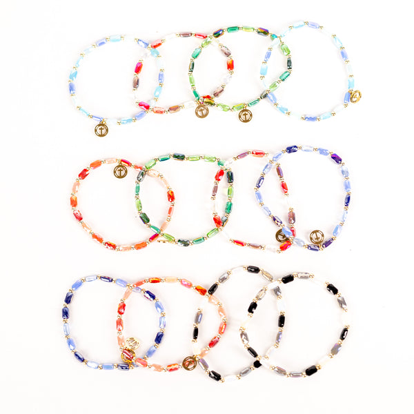 Brǎțarǎ elastic bile cristial si cruce inox.  AC81-1