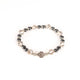 Brǎțarǎ elastic bile hematit si cruce metal.   OT33-313